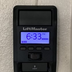Garage Door Store - Wall controller for programming and garage door operation.