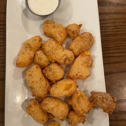 The Free House Pub - WISCONSIN CHEESE CURDS hand-breaded Wisconsin cheddar curds, buttermilk ranch