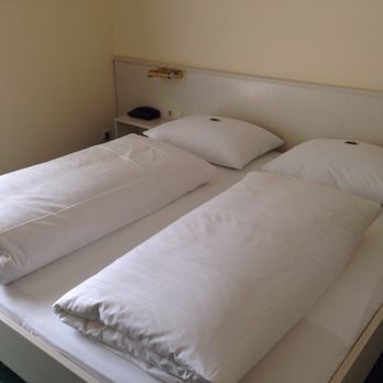 Hotel Huberhof - Bedroom. - Hotels Near Me - Allershausen, BY Hotel Huberhof - Bedroom. - Hotels Near Me - Allershausen, BY