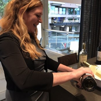 AC Lounge - Haley is serving up some free local wine. - Cocktail Bars Near Me - Bellevue, Washington AC Lounge - Haley is serving up some free local wine. - Cocktail Bars Near Me - Bellevue, Washington