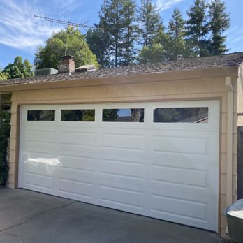Garage Door Center - Insulated Long raised panel with clear glass top section - Garage Door Services Near Me Garage Door Center - Insulated Long raised panel with clear glass top section - Garage Door Services Near Me