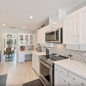 D Bassett Roofing & Renovation - kitchen with stainless steel appliances - Roofing Near Me - Arlington, Texas