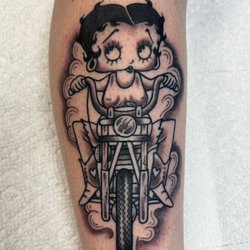 Evolution Tattoo