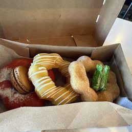 Mochi donuts , half eaten macarons Mochi donuts , half eaten macarons