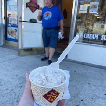 Kilwins Ice Cream - Chocolate - Fudge - a man walking in the background - Ice Cream & Frozen Yogurt Near Me - Venice, Florida Kilwins Ice Cream - Chocolate - Fudge - a man walking in the background - Ice Cream & Frozen Yogurt Near Me - Venice, Florida