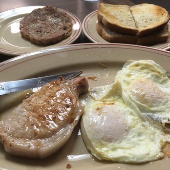 Blue Moon Cafe - Pork chop with eggs, sausage patty on the side, rye toast. So good. - Diners Near Me - Jackson, Michigan