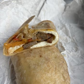 The Bagel Hole - Breakfast burrito . . . greasy tortilla. Not worth $11+ - Bagels Near Me - Dawsonville, Georgia