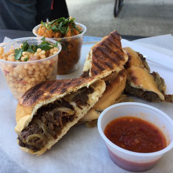 KoKyu Na'Mean - The pressed short rib with sides of couscous and sweet potato salad. - Sandwiches Near Me - Durham, North Carolina KoKyu Na'Mean - The pressed short rib with sides of couscous and sweet potato salad. - Sandwiches Near Me - Durham, North Carolina