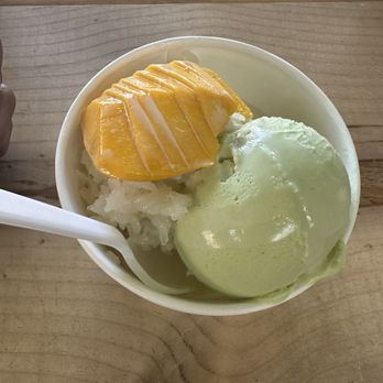 Coco Bomb - Pandan and Mango ice cream scoops with fresh mango and sticky rice topping - Cafes Near Me - San Diego, California