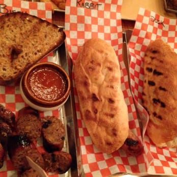 Wvrst - Bison curry wurst on left, labeled hot dogs on right - German Near Me - Toronto, Ontario Wvrst - Bison curry wurst on left, labeled hot dogs on right - German Near Me - Toronto, Ontario