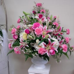 Charleston Cut Flower - Funeral urn on pedestal.