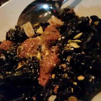 Coppa Enoteca - Squid ink pasta with sausage and squid pieces - Italian Near Me - Boston, Massachusetts Coppa Enoteca - Squid ink pasta with sausage and squid pieces - Italian Near Me - Boston, Massachusetts