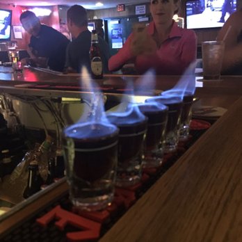 O'Hennings - a woman sitting at a bar - Cocktail Bars Near Me - Bakersfield, California