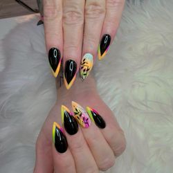 Fancy Nails & Spa - This is a beautiful set of nails. The staff here are very cute. good price