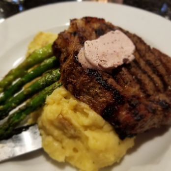 Karline's Restaurant - Angus ribery, mashed potatoes, marinated asparagus and compound butter - Bars Near Me - Redding, California