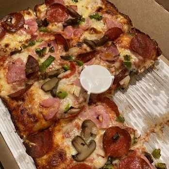 Jet's Pizza - Supreme pizza, with two slices already missing - Pizza Near Me - St Louis, Missouri
