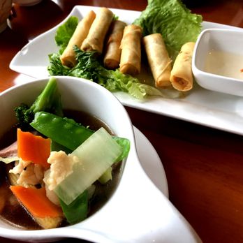Tony's Fusion West - a bowl of soup and a plate of spring rolls - Asian Fusion Near Me - Westhampton Beach, New York Tony's Fusion West - a bowl of soup and a plate of spring rolls - Asian Fusion Near Me - Westhampton Beach, New York