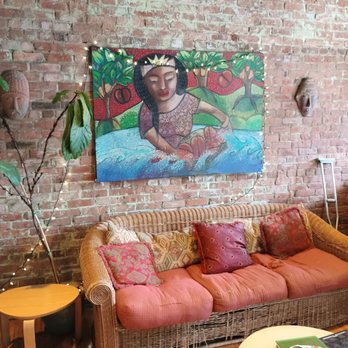 Green Planet Coffee Company - Couch and somebody in a stresm washing humongous coffee beans - Coffee & Tea Near Me - Manasquan, New Jersey