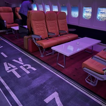 The Aviator - A different way to work the runway -- and sip cocktails in refurbished Continental Airlines DC-10 airline seats. - Tapas/Small Plates Near Me - Los Angeles, California The Aviator - A different way to work the runway -- and sip cocktails in refurbished Continental Airlines DC-10 airline seats. - Tapas/Small Plates Near Me - Los Angeles, California