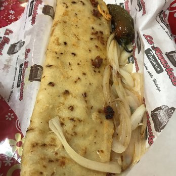 Taqueria La Huasteca - Machete with mixed chorizo, Tinga and puerco - Juice Bars & Smoothies Near Me - Dallas, Texas