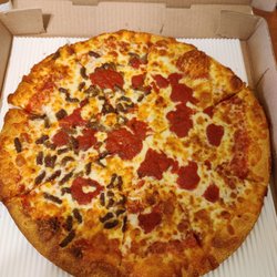 The usually half Cheese half ground beef Pizza. Nice buttery Crust. Yum