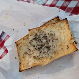 Garlic bread, after a few bites Garlic bread, after a few bites