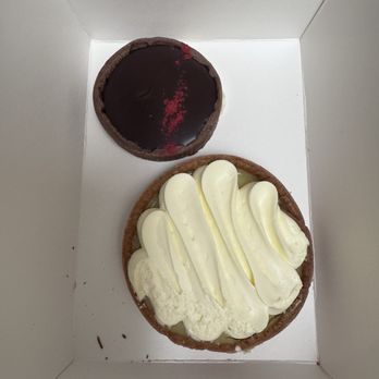 Left Bank Pastry - Lemon Tart, Dark chocolate raspberry tart - Bakeries Near Me - Olympia, Washington Left Bank Pastry - Lemon Tart, Dark chocolate raspberry tart - Bakeries Near Me - Olympia, Washington