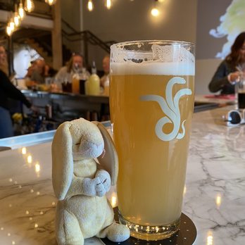 Antifragile Brewing - a stuffed bunny next to a glass of beer - Breweries Near Me - State College, Pennsylvania
