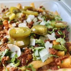 Rigo’s Taqueria - Rigo's fries con chorizo. Yum!