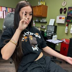 Sacred Nine Tattoo Studio