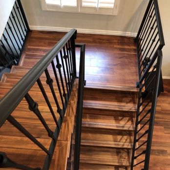 Vallin Bros Contractor’s - Custom walnut stair bullnose to match Aqua Guard 'Cerise' laminate flooring - Flooring Near Me Vallin Bros Contractor’s - Custom walnut stair bullnose to match Aqua Guard 'Cerise' laminate flooring - Flooring Near Me