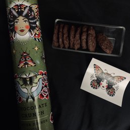 Packaging, chocolate crunch cookie and sticker Packaging, chocolate crunch cookie and sticker