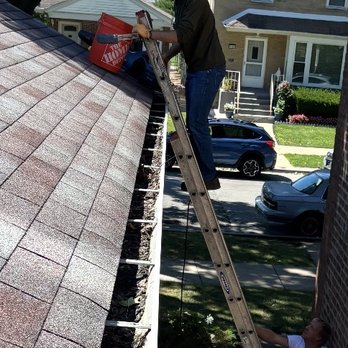 Best Price Gutter Clean - Sebastian is on the ladder and Steve is on the ground. This isn't my home, but I wanted to show you who they are with this pic! - Gutter Services Near Me - Chicago, Illinois