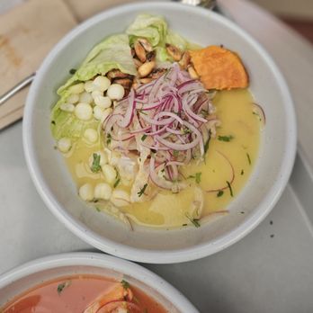 Andes Cafe - Fish Ceviche (Pescado) | PERU Fresh mahi-mahi, lime, aji amarillo tiger's milk, red onions, and cilantro. Bold & tangy! $18 - Latin American Near Me - Houston, Texas Andes Cafe - Fish Ceviche (Pescado) | PERU Fresh mahi-mahi, lime, aji amarillo tiger's milk, red onions, and cilantro. Bold & tangy! $18 - Latin American Near Me - Houston, Texas