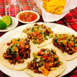 Playita Mexicana - Carne asada tacos with salsa and chips.
