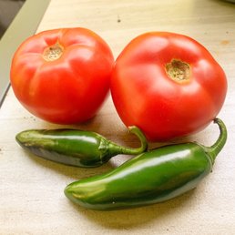 Fresh tomatoes and jalapeños Fresh tomatoes and jalapeños