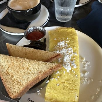 Petite Suzette - Creamed corn and spinach omelet - French Near Me - Montgomery, Texas Petite Suzette - Creamed corn and spinach omelet - French Near Me - Montgomery, Texas
