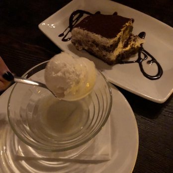 Uva - Tiramisu and a scoop of vanilla gelato. All taste amazing! - Italian Near Me - New York, New York