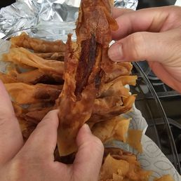 The dark area is the banana so hard and burnt you couldn't even chew or bend it.