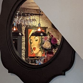 Polina Pizzeria - a woman's face in a mirror - Pizza Near Me - Quebec City, Quebec Polina Pizzeria - a woman's face in a mirror - Pizza Near Me - Quebec City, Quebec