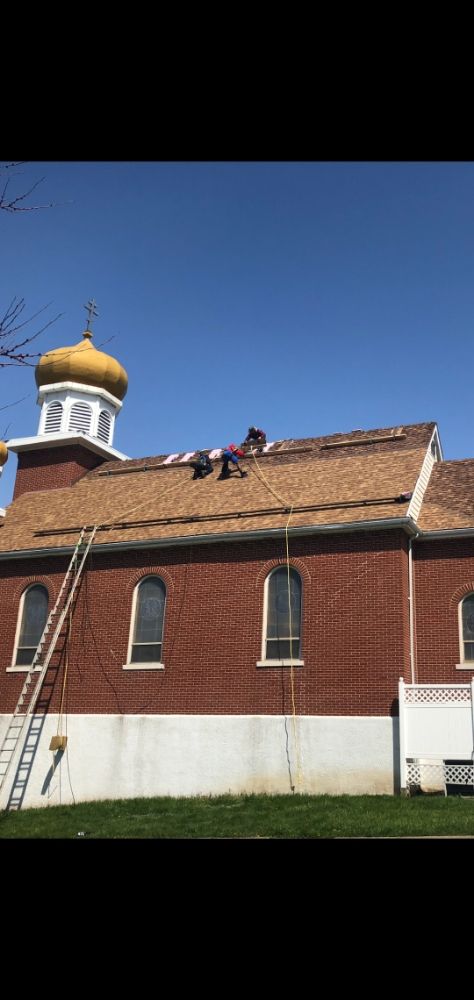 Slide of Rashids Roofing