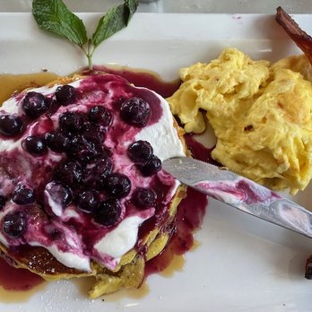 Jeannine's Bakery & Restaurant - Lemon Poppyseed pancakes with Ginger Blueberry Sauce & Whipped Greek Yogurt. Comes with 2 eggs & bacon, sausage, or ham. Ultimate Best!! - Bakeries Near Me - Montecito, California Jeannine's Bakery & Restaurant - Lemon Poppyseed pancakes with Ginger Blueberry Sauce & Whipped Greek Yogurt. Comes with 2 eggs & bacon, sausage, or ham. Ultimate Best!! - Bakeries Near Me - Montecito, California