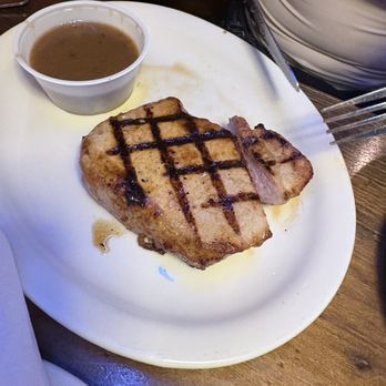 Texas Roadhouse - Grilled pork chop with sautéd mushrooms - Steakhouses Near Me - Indio, California Texas Roadhouse - Grilled pork chop with sautéd mushrooms - Steakhouses Near Me - Indio, California