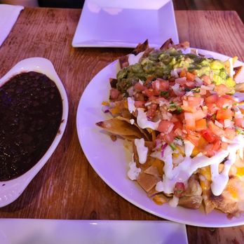 Xochitl Taqueria - Chicken nachos (beans on the side) - Mexican Near Me - Brooklyn, New York Xochitl Taqueria - Chicken nachos (beans on the side) - Mexican Near Me - Brooklyn, New York