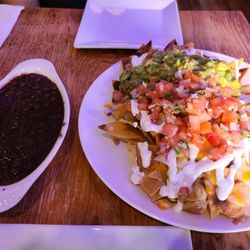 Xochitl Taqueria - Chicken nachos (beans on the side)