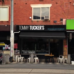 Tommy Tucker's - Spot for Tommy Tucker's sign outside against the red bricks