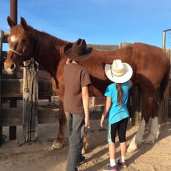 Effus Ranch - My kids brushing my daughter's horse after a great ride