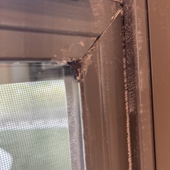 Lowe's Home Improvement - Damaged frame that they tried to repair with caulk - Hardware Stores Near Me - Scottsdale, Arizona