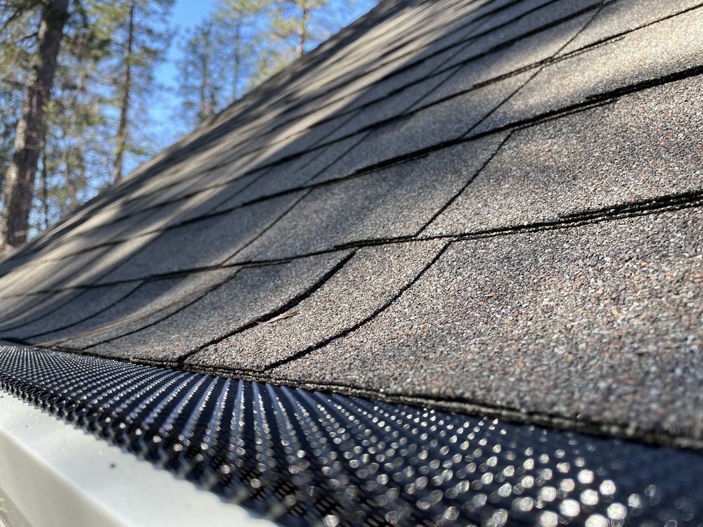 Slide of Logan Roofing