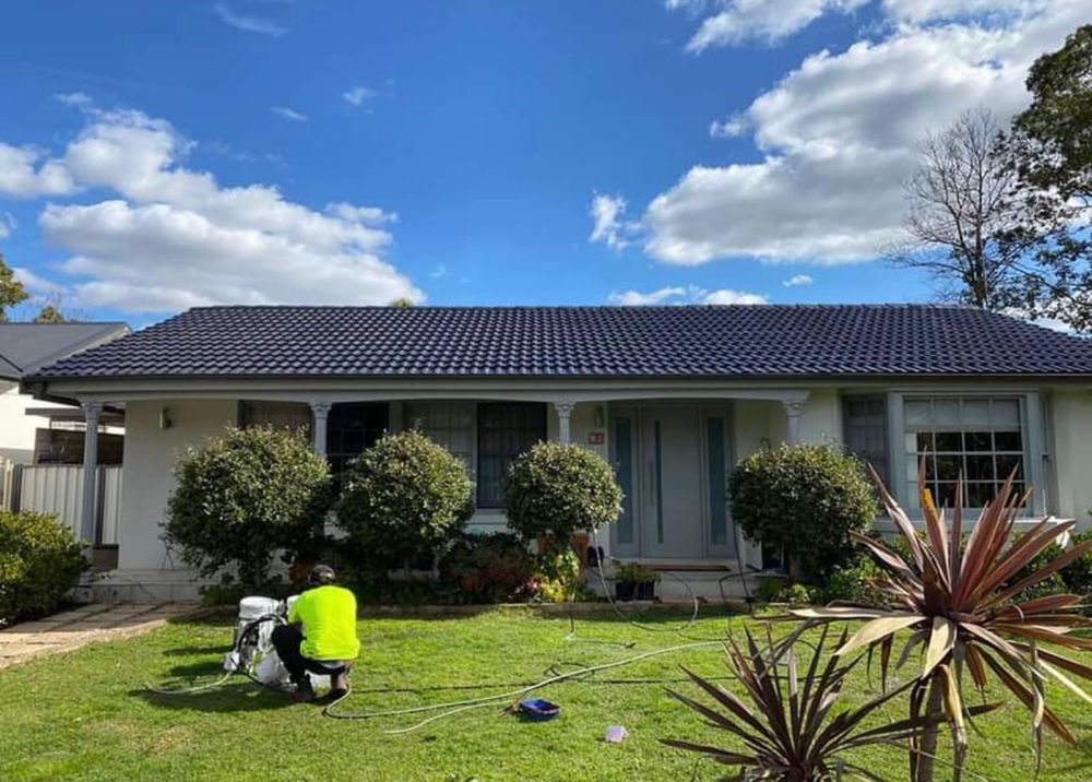Slide of Olive Tree Roofing and Construction
